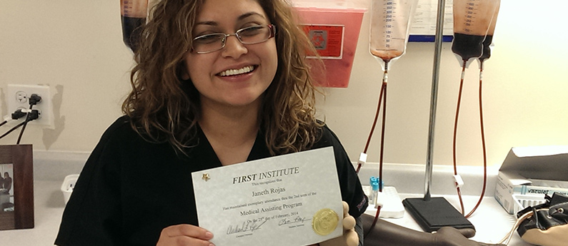 Student holding her perfect attendance record